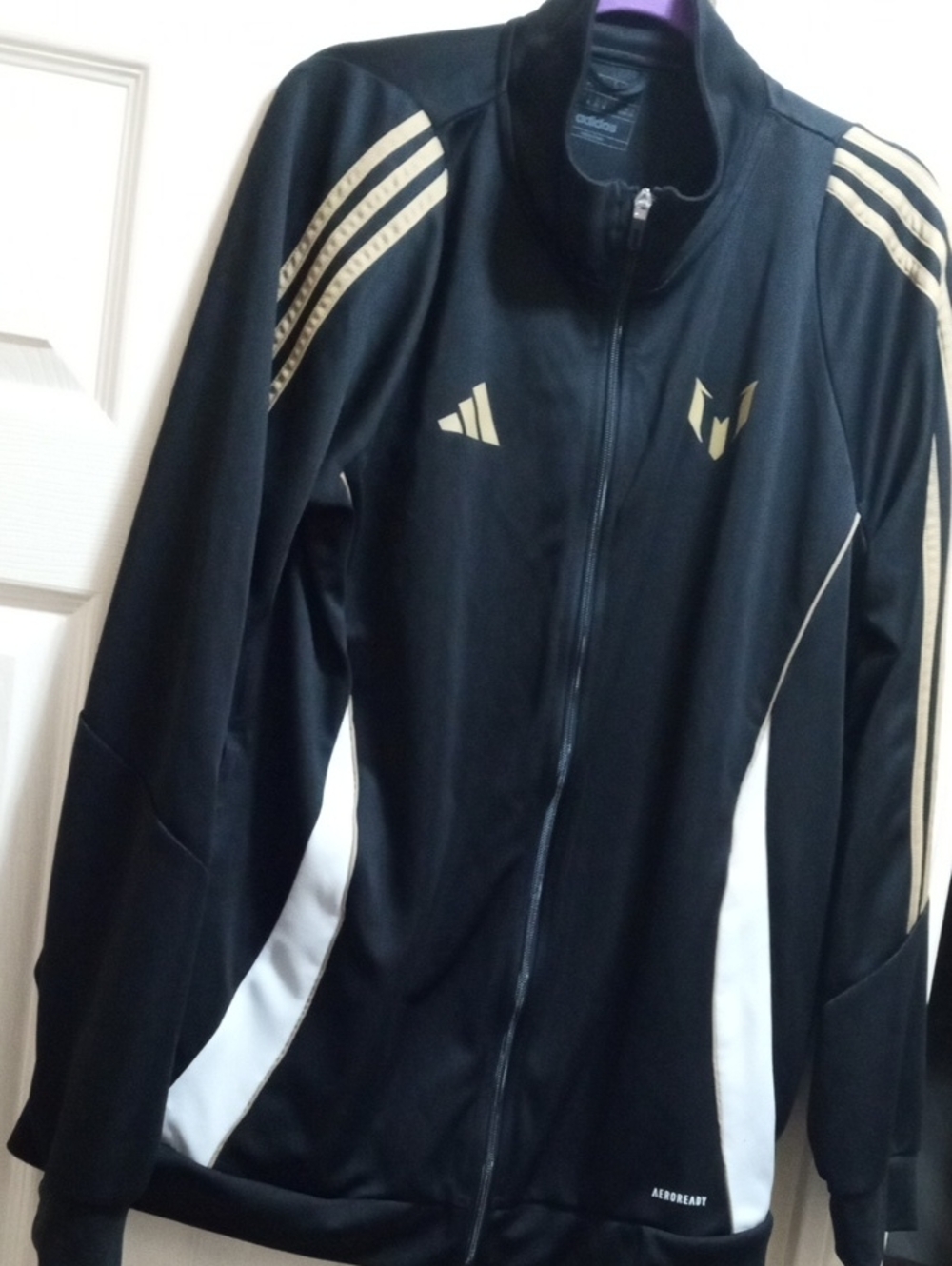 adidas Black Jacket with Gold Accents and White Panels